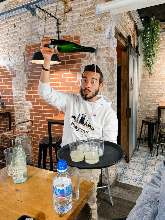 Barcelona. Cava poured from a height, the Catalan way.