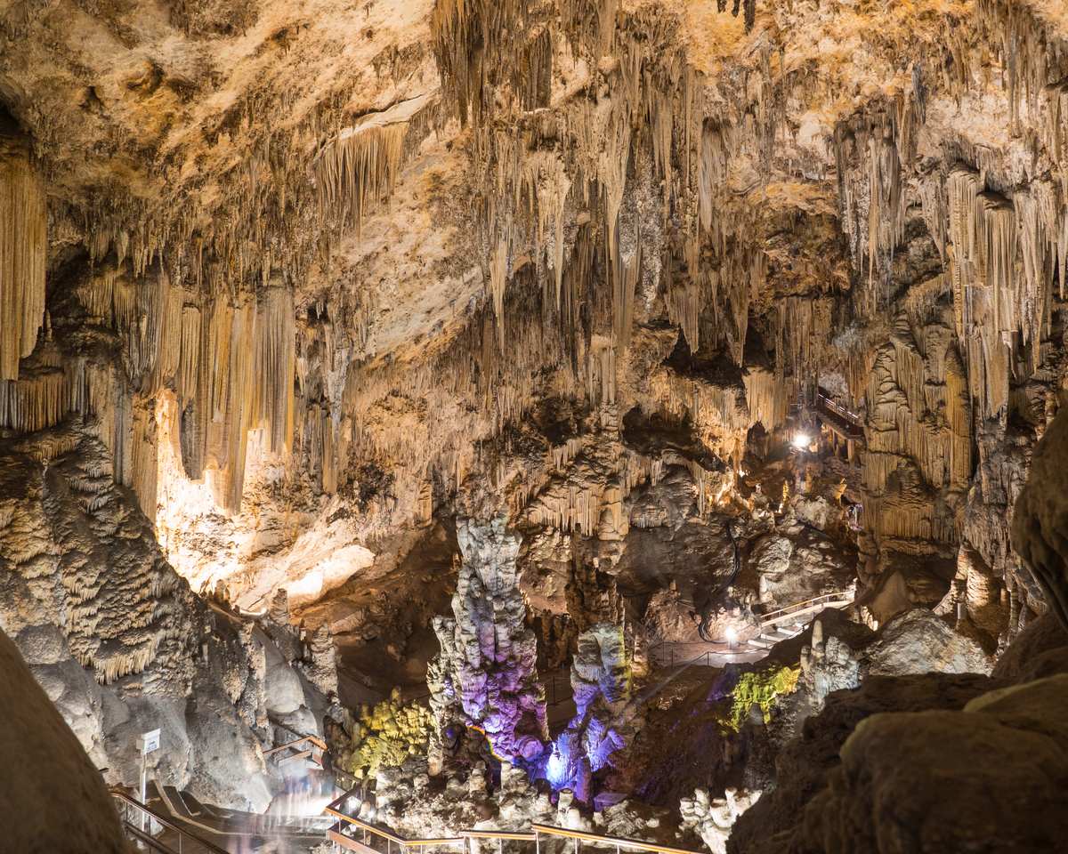 Day 4 · Caving + Transfer